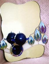 Spiegel mit Kugelkerze